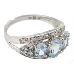 9ct white gold oval blue topaz and diamond ring, hallmarked