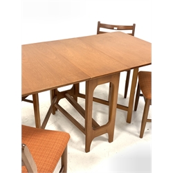 Set four 1970s teak framed dining chairs with upholstered seats and a teak drop leaf dining table, H74cm, 144cm x 83cm (open) 