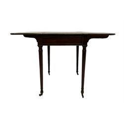 George III mahogany drop leaf games table, the reversible sliding top with satinwood parquetry chessboard, opening to reveal an inlaid backgammon board, raised on turned tapering supports terminating in brass cups and castors