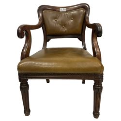 William IV rosewood elbow chair, shaped back over scrolled arm terminals, upholstered in olive green leather, raised on turned reeded supports with carved acanthus leaves