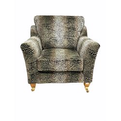 Duresta 'Heratio' contemporary upholstered armchair, covered in high quality velvet fabric, raised on square tapered supports with brass castors W92cm