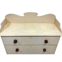 Early 20th century cream painted pine chest, raised back, fitted with three graduating drawers, raised on bun feet