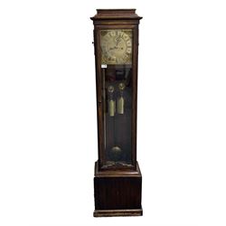 Eight day Grandmother clock in oak case, the associated brass dial with Roman numeral chapter ring striking the hours on a 4' brass pipe H163cm