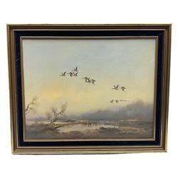 Howard Devonald (British 1944-): Geese in Flight over Marshland, oil on canvas signed 35cm x 45cm; Tony Shorthouse (British 20th century): Winter Morning, oil on canvas signed 50cm x 75cm (2)