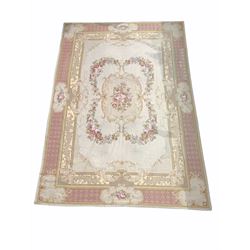 Aubusson design flatweave tapestry ground carpet, the ivory field with rose bouquets within floral cartouche and bordered 415cm x 300cm
