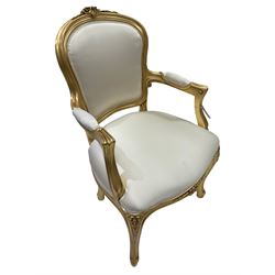 Silik Lo Stile Di Classe - Italian gilt hardwood framed armchair, cresting rail decorated with flower heads, upholstered seat, back and arms with scrolling hand rail, raised on scrolled and fluted cabriole supports