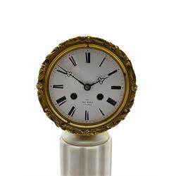 Early 19th century Parisian pillar clock, dial inscribed Henri Marc, Paris, with an unenclosed drum movement raised on a circular fluted white marble column and square base, white enamel dial with Roman numerals, minute track and steel trefoil hands within a foliate cast brass bezel, twin barrel movement with a silk suspension, striking the hours and half hours on a silvered bell. With pendulum and key