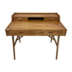 Arne Wahl Iversen for Vinde Mobelfabrik - mid-20th century Danish teak writing desk, model 64, raised back shelf fitted with central pigeon hole flanked by two drawers, rectangular writing surface fitted with two larger drawers, raised on splayed tapering supports united by stretcher, VM stamp to base and 'Danish Furniture Makers Control' stamp to drawer