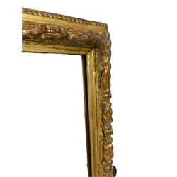 20th century rectangular giltwood and gesso wall mirror, the frame decorated with fruiting foliage, beaded outer edge, plain mirror plate 
Provenance: From the Estate of the late Dowager Lady St Oswald