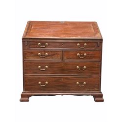 George III mahogany bureau, the fall front revealing interior well fitted with inset writing surface, correspondence shelves, concealed drawers, cupboards and a well, two short and three long drawers under, raised on ogee bracket supports W101cm 