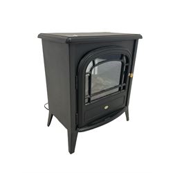 Electric fan heater in the form of a wood burning stove 