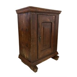 18th century design oak plank cupboard, moulded cornice over single panelled door, fitted with two internal shelves, moulded lower skirt over on sledge supports