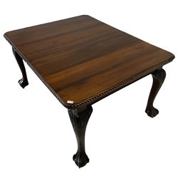 19th century mahogany extending dining table, the extendable top with two additional leaves with moulded edge over blank frieze, raised on carved cabriole supports with ball and claw feet, raised on castors  