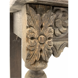 Victorian oak hall table, with raised back and frieze profusely carved with floral roundels, raised on turned supports 