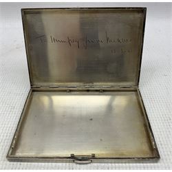 French silver and parcel gilt cigarette case by Chaumet et Cie, the interior with presentation inscription dated 24-3-45, the exterior with reeded panels 12cm x 8cm 5.4oz