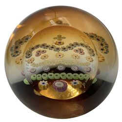 Five paperweights comprising; Okra 'Amethyst' limited edition no. 39/500 another Okra paperweight, both by Richard P. Golding, Perthshire large patterned Millefiori paperweight and two Caithness: 'Trailblazer' and 'Gold Crown, all boxed (5)