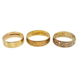 Two gold wedding bands and one other set with white paste stones, all hallmarked 9ct