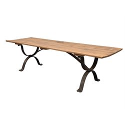 Large contemporary blacksmith made dining table, the rectangular oak top raised on wrought iron 'X' end supports H77cm  W288cm  D87cm