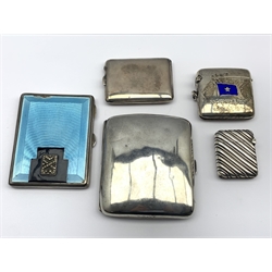  Silver and blue enamel cigarette case with a marcasite panel Birmingham 1930, plain silver cigarette case, silver vesta case with blue enamel flag inscribed 'S.S. Godfrey B Holt' and two other vesta cases approx 10oz  