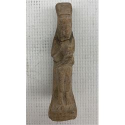 Carved stone Egyptian ushabti in the form of a standing figure H17cm and another seated holding a child H9cm (2)