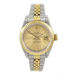 Rolex Oyster Perpetual Datejust ladies stainless steel and gold automatic wristwatch, Ref. 69173, Serial No. R459064, textured champagne dial with baton hour markers, on Jubilee bracelet, with service papers