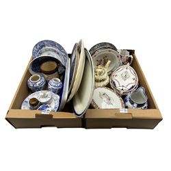 Victorian and later ceramics including two tureens, Ming pattern blue and white jug, Willow pattern meat plate, Burgess's paste box etc in two boxes