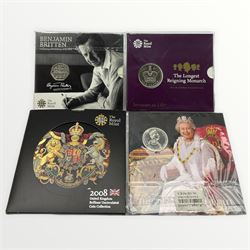 The Royal Mint 2008 United Kingdom brilliant uncirculated coin collection, 2013 Benjamin Britten fifty pence coin, 2015 The Longest Reigning Monarch brilliant uncirculated five pounds and The 2012 Diamond Jubilee annual coin set, all housed in card folders
