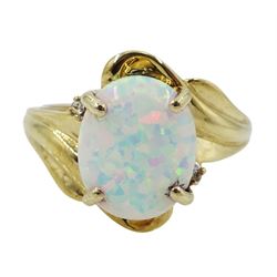 9ct gold oval opal and diamond chip ring, hallmarked