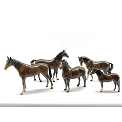 Beswick model of a Swish Tailed Horse No. 1182 in brown gloss, first version,  Beswick race horse in brown gloss No. 701. second version and three other brown gloss Beswick horses (5)