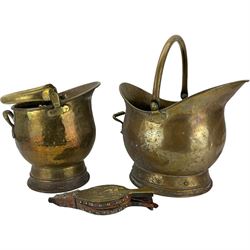 Two brass coal scuttles and a box of metalware