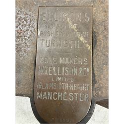  A cast iron turnstile from York City football ground by Ellison & Co., Manchester, painted green with crowed counter with brass plate H104cm, W110cm, D104cm 