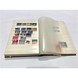 Great British Queen Elizabeth II mostly mint, mostly decimal stamps, face value of useable postage over 100 GBP,  in one album