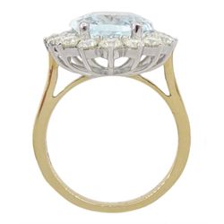 Gold oval aquamarine and round brilliant cut diamond cluster ring, hallmarked 14ct, aquamarine approx 4.98 carat, total diamond weight approx 1.30 carat, with Independent Diamond Grading laboratories report