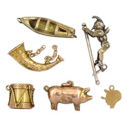Victorian and later pendant / charms including gold horn, malachite drum, cartoon face and cobble boat, all 9ct, silver articulated Punch / jester and a gold-plated pig