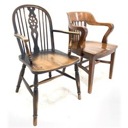 Early 20th century mahogany desk chair, shaped cresting rail over square spindle back rest, saddle seat, raised on square tapered supports united by stretcher (W61cm) together with another early 20th century chair 