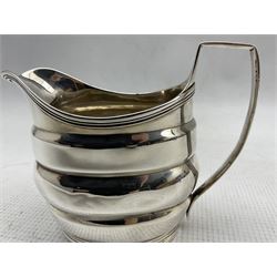 George III silver cream jug with reeded handle and rim, London 1801 Maker Robert Hennell I & David Hennell II,, approx 4.4oz