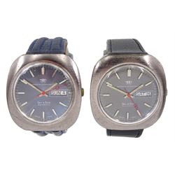 Two Watches of Switzerland Day & Date gentleman's automatic stainless steel and plated wristwatches, blue/grey dials with day/date apertures, on leather straps