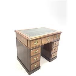 Late 19th century walnut twin pedestal desk, inset tooled leather writing surface over nine drawers, skirted base 