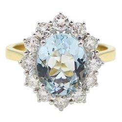 18ct gold oval aquamarine and round brilliant cut diamond cluster ring, hallmarked, aquamarine approx 2.35 carat, total diamond weight approx 0.75 carat