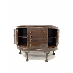 Mid 20th century mahogany bow front sideboard, the raised back over top with gadroon moulded edge, four drawers to centre flanked by two cupboards, raised on leaf carved cabriole supports with ball and claw feet W119cm, H97cm, D55cm 
