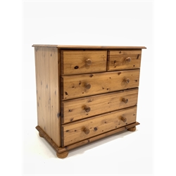 Modern polished pine chest fitted with two short and three long drawers, raised on turned bun supports, W84cm, H77cm, D47cm