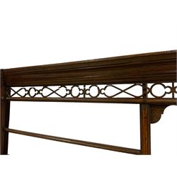 George III oak plate rack, projecting cornice over pierced open fretwork frieze, the three tier plate rack with central pigeonholes, and flanked by fluted column uprights