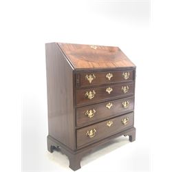 Early 20th century Georgian style mahogany bureau, fall front revealing well fitted interior and baize writing surface over four graduated drawers, raised on bracket supports 