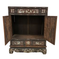 Early 20th century Chinese hardwood and mother of pearl inlaid panelled cabinet, decorated with warrior scenes, trailing foliate patterns and bird motifs, on shaped apron and curved bracket feeet