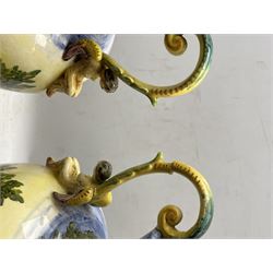 Pair Italian urn form lamps depicting Iliadic scene of Helen of Troy with Paris, each titled 'Paride E Elena', on pierced brass shaped bases, H63cm overall