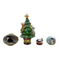 Four Halcyon Days Cat and Kitten decorated boxes comprising a Christmas Tree bonbonniere, 'Black & White Kitten' by Chrissy Wilson, 'Sleepy Pussy-Cat' and one other (4)