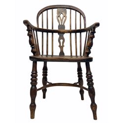 Early 19th century low back elm and ash Windsor chair, with double hoop, spindle and splat back over saddle seat, raised on turned supports with crinoline stretcher 