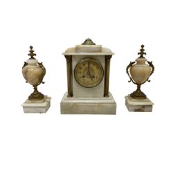 French - late 19th century Onyx cased mantle clock and conforming garnitures with an 8-day striking movment striking the hours and half hours on a coiled gong, rectangular formed case with recessed brass pillars and corinthian capitals, gilt metal dial with pierced decoration to the centre, arabic numerals and steel flur di Lis hands within a cast brass bezel. With pendulum. Garnitures H 28cm.