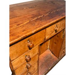 Early 19th century pine clerks desk, sloped writing top, eleven drawers