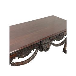 18th century style mahogany serving table, the rectangular top with moulded edge over carved frieze with folate design, with one central carved lion mask, raised on cabriole supports terminating in hairy paw feet W168cm, H85cm, D76cm 